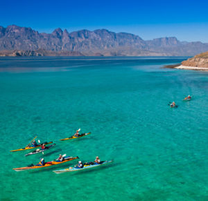 kayaking in the crystal-clear waters of Baja, Mexico