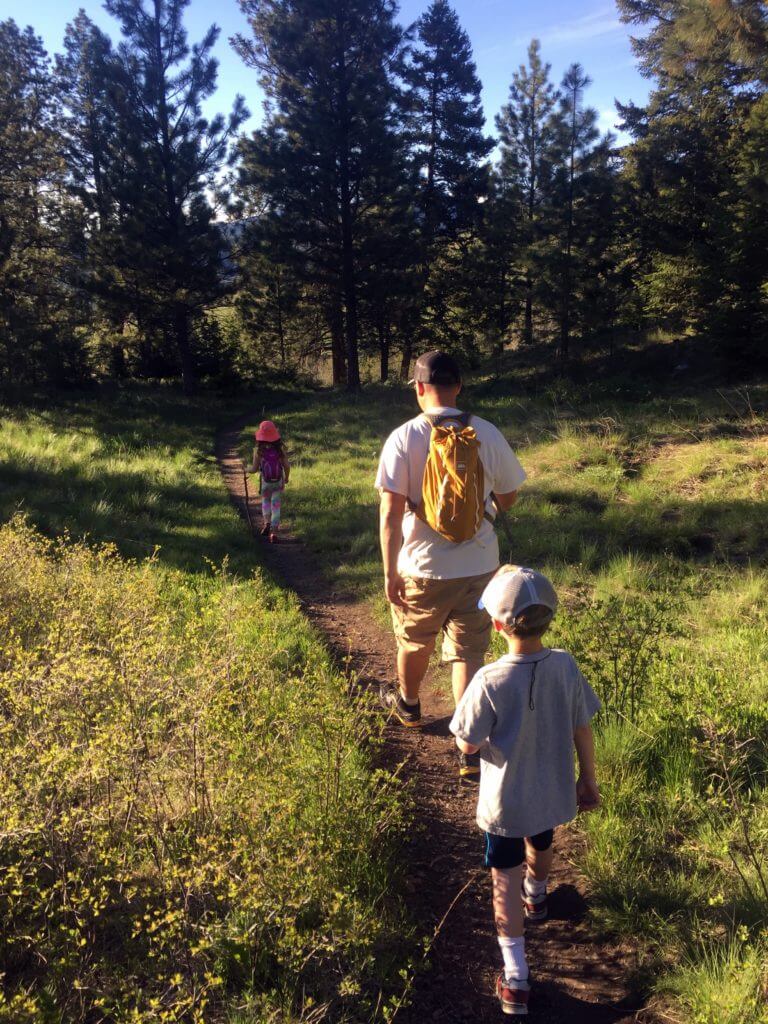 family hiking in the outdoors